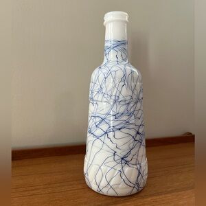 Vintage Hazel Atlas milk glass bottle - blue spaghetti string drizzle pattern